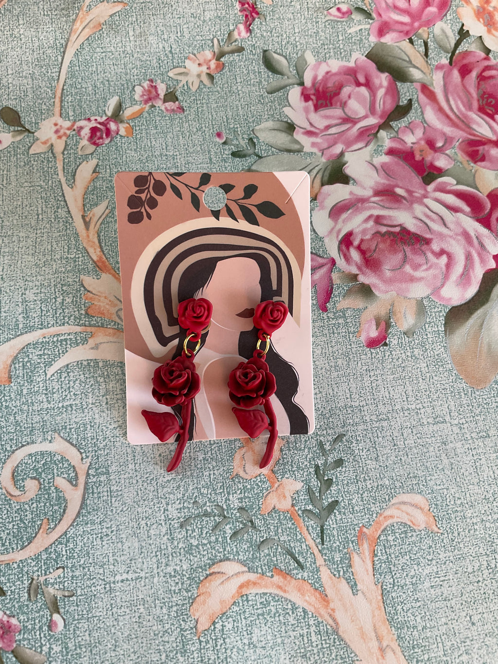 Pendientes rosas rojas