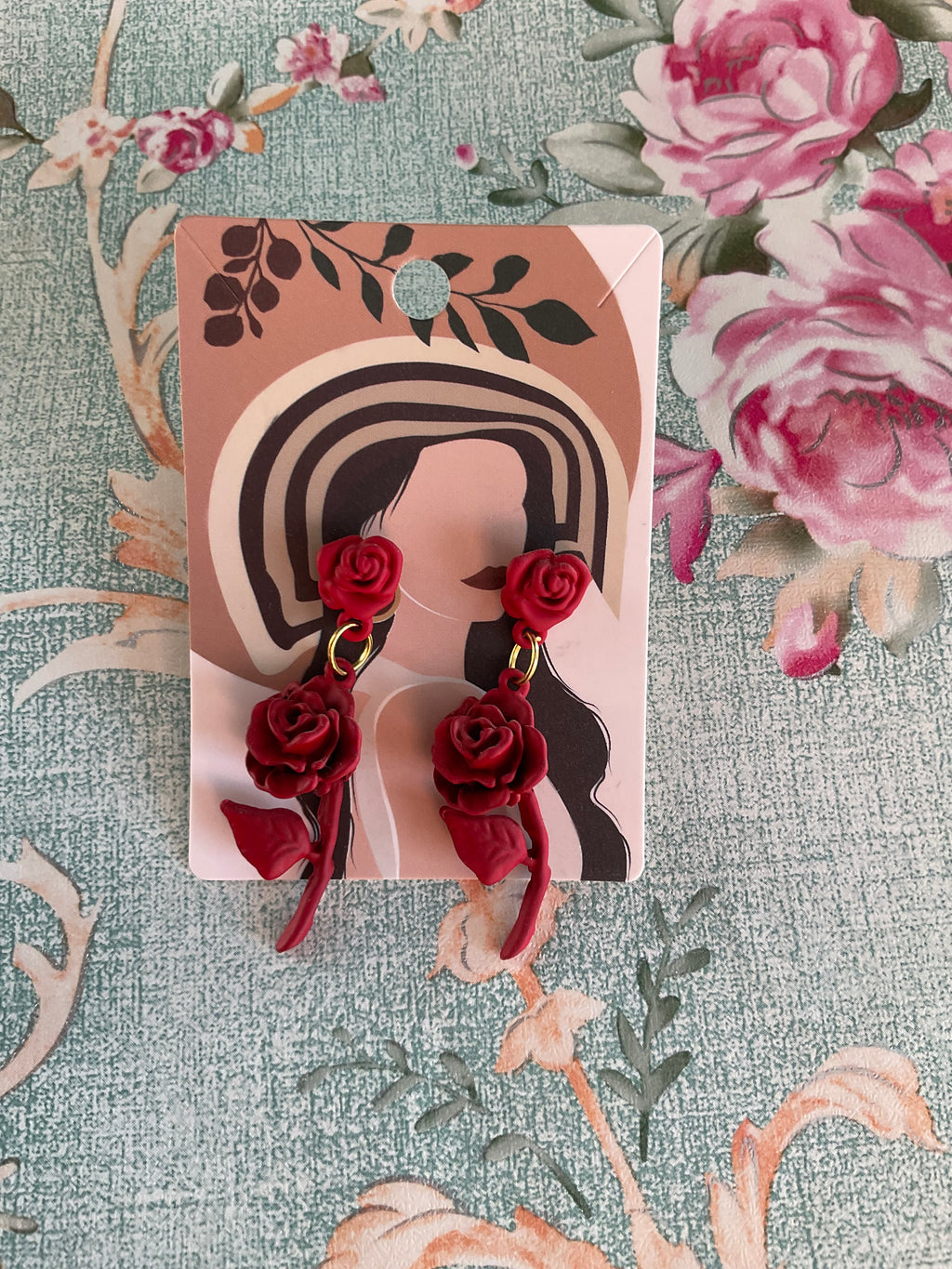 Pendientes rosas rojas