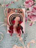 Pendientes rosas rojas